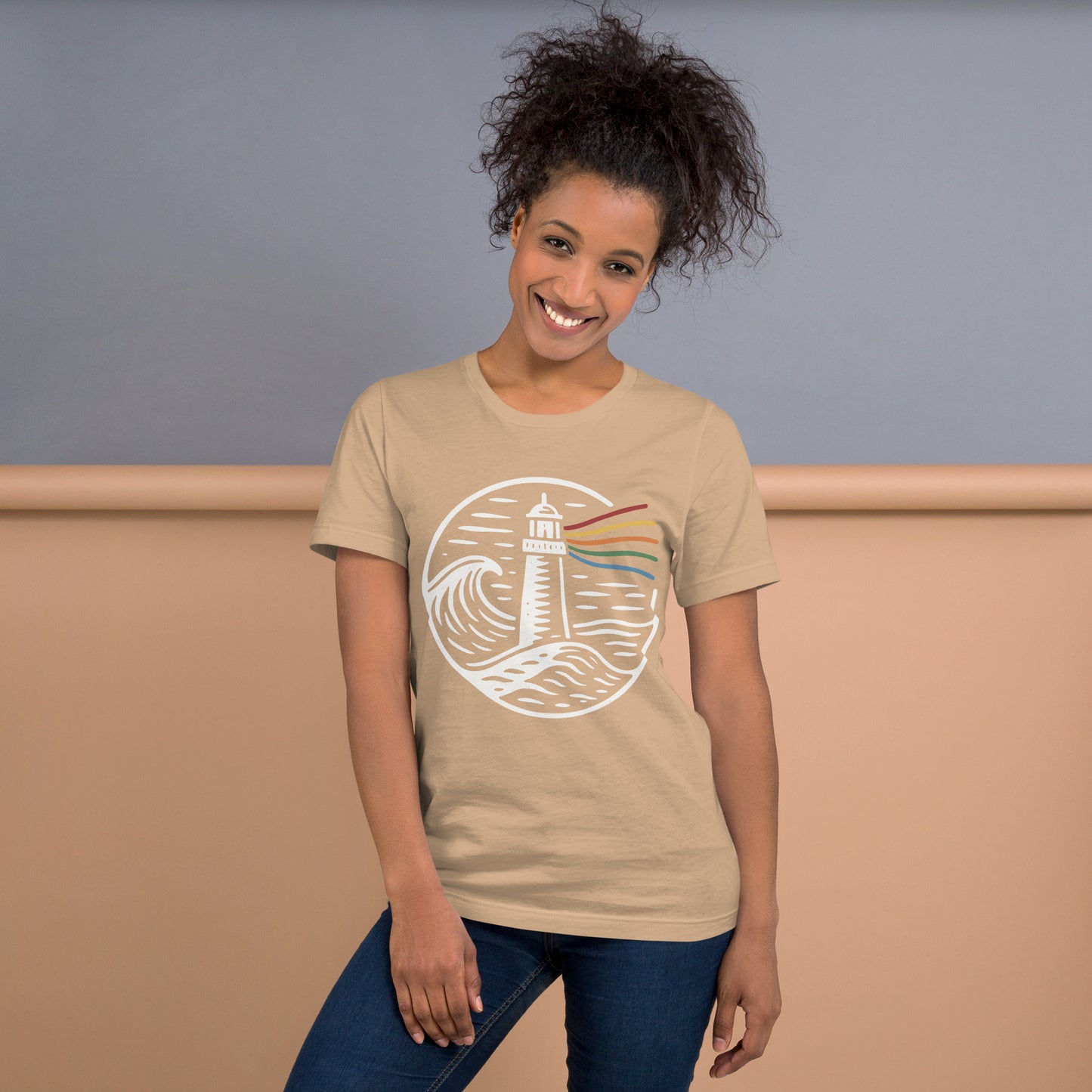 A Beacon Always Burns Lighthouse T-Shirt — tan, front view, queer-owned PNW Pride apparel