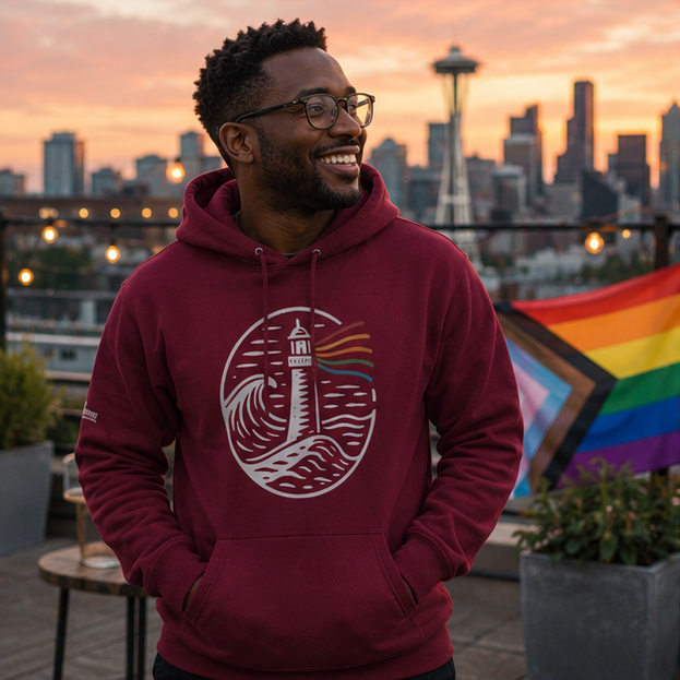 A Beacon Always Burns Hoodie at a Seattle Pride rooftop gathering — queer-owned PNW Pride apparel, front view