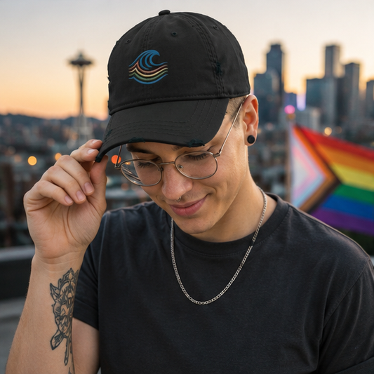 BreakWater Canvas Cap at a Seattle Pride rooftop gathering — queer-owned PNW Pride apparel, front view