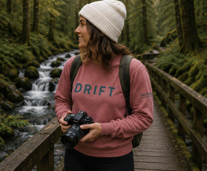 Drift Sweatshirt at a Pacific Northwest forest boardwalk — queer-owned PNW Pride apparel, front view