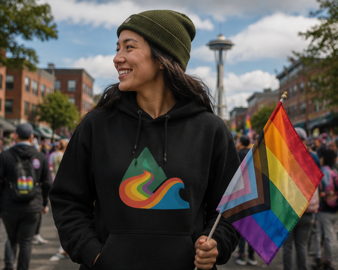 EverProud Logo Minimalist Hoodie at a Pride community gathering — queer-owned PNW Pride apparel, front view