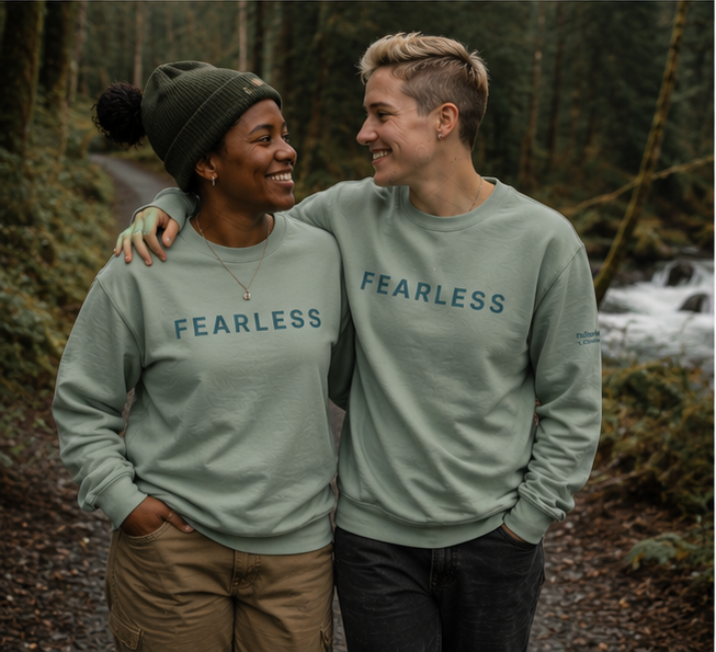 Fearless Sweatshirt at a Pacific Northwest forest trail — queer-owned PNW Pride apparel, front view
