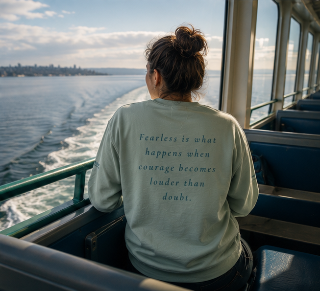 Fearless Sweatshirt at a Pacific Northwest ferry deck — queer-owned PNW Pride apparel, back view