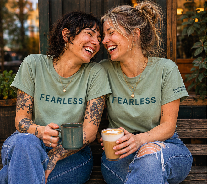 Fearless Women's Relaxed T-Shirt at a Pacific Northwest coffee shop — queer-owned PNW Pride apparel, front view