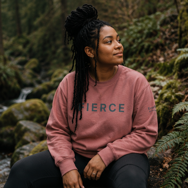 Fierce Sweatshirt at a Pacific Northwest forest creek — queer-owned PNW Pride apparel, front view