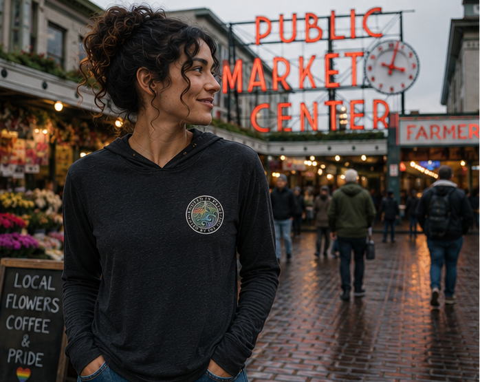 Moved by the Tide Hooded Long Sleeve Tee at Pike Place Market — queer-owned PNW Pride apparel, front view