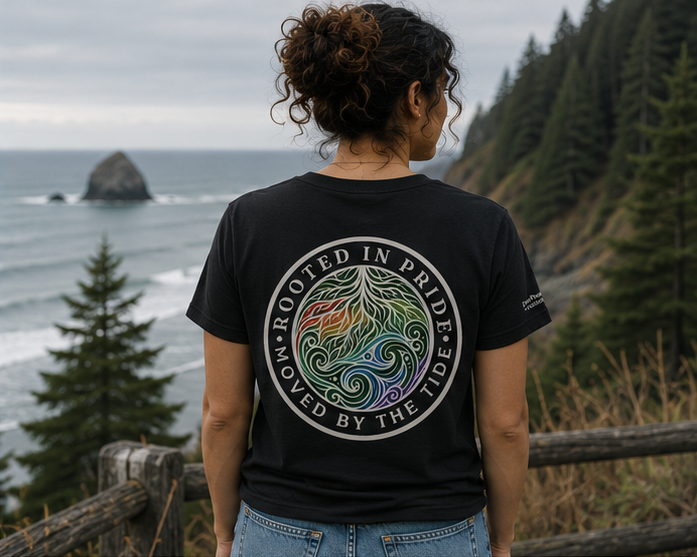 Moved by the Tide T-Shirt on the Oregon coast — queer-owned PNW Pride apparel, back view