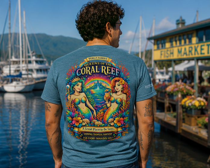 Queens of the Coral Reef T-Shirt at a Pacific Northwest marina market — queer-owned PNW Pride apparel, back view