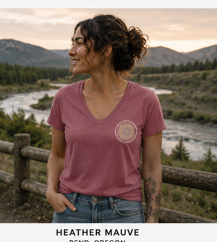 Quiet Rings Women's Relaxed V-Neck T-Shirt at an overlook near Bend, Oregon — queer-owned PNW Pride apparel, front view