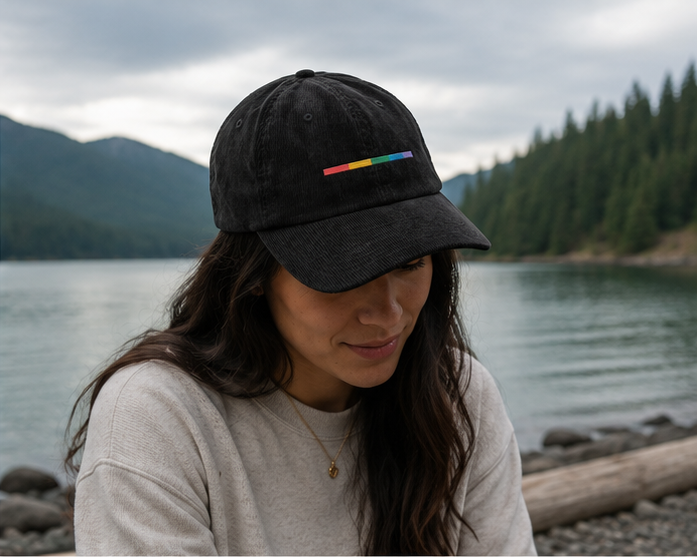 Signal Corduroy Cap at a misty Pacific Northwest mountain lake — queer-owned PNW Pride apparel, front view