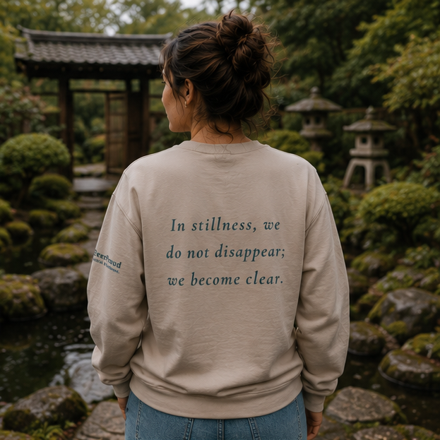 Still Sweatshirt at a Japanese garden — queer-owned PNW Pride apparel, back view with inspirational quote
