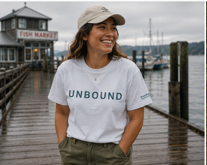 Unbound T-Shirt on a harbor dock — Pacific Northwest LGBTQ+ Pride graphic tee, front view