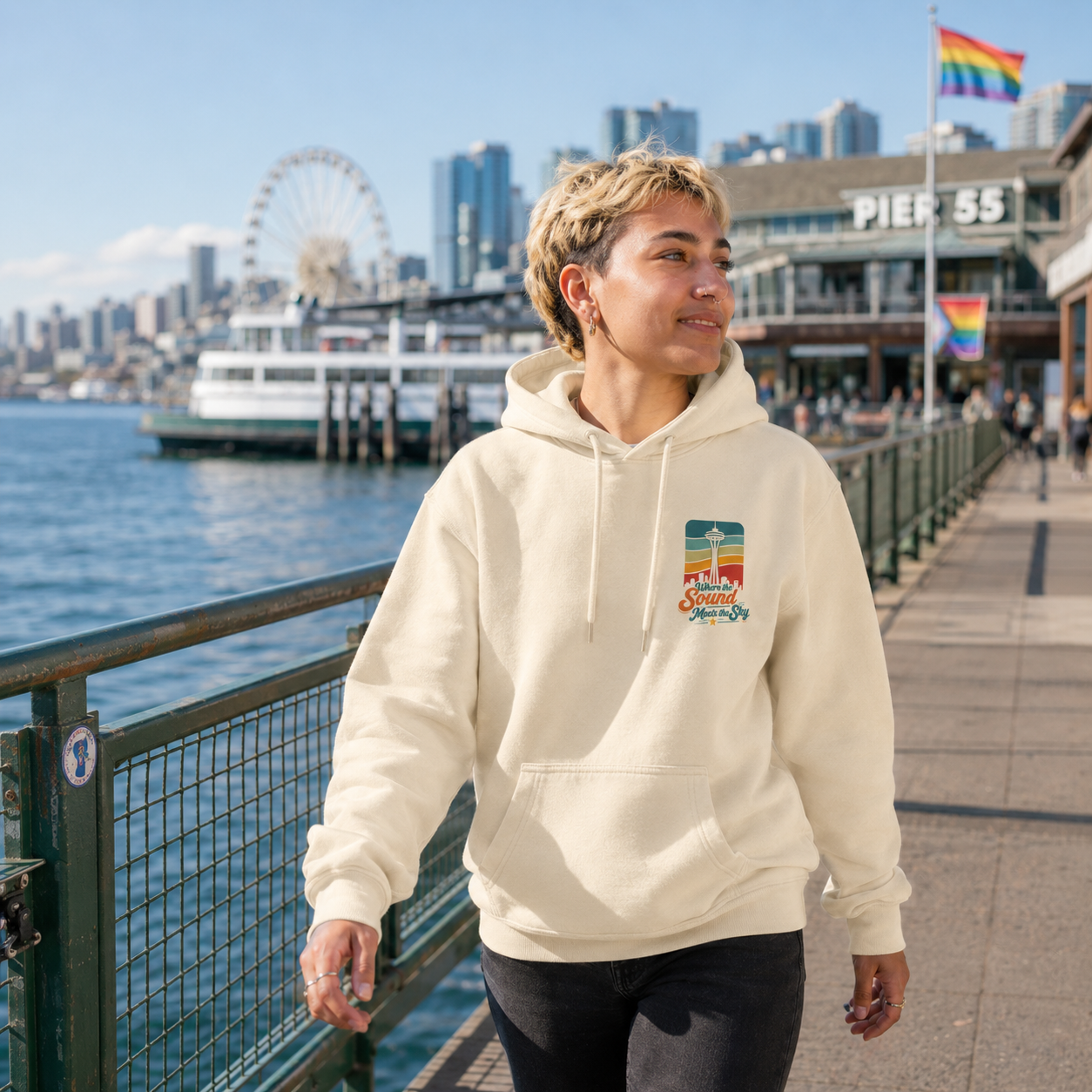 Where the Sound Meets the Sky Hoodie at Pier 55 waterfront — queer-owned PNW Pride apparel, front view